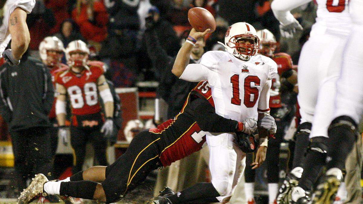 N.C. State’s Russell Wilson (16) is sacked by Maryland’s Drew Gloster on a fourth-and-goal play in the fourth quarter of the Wolfpack’s 38-31 loss in 2010. The loss kept the Wolfpack out of the ACC Championship.