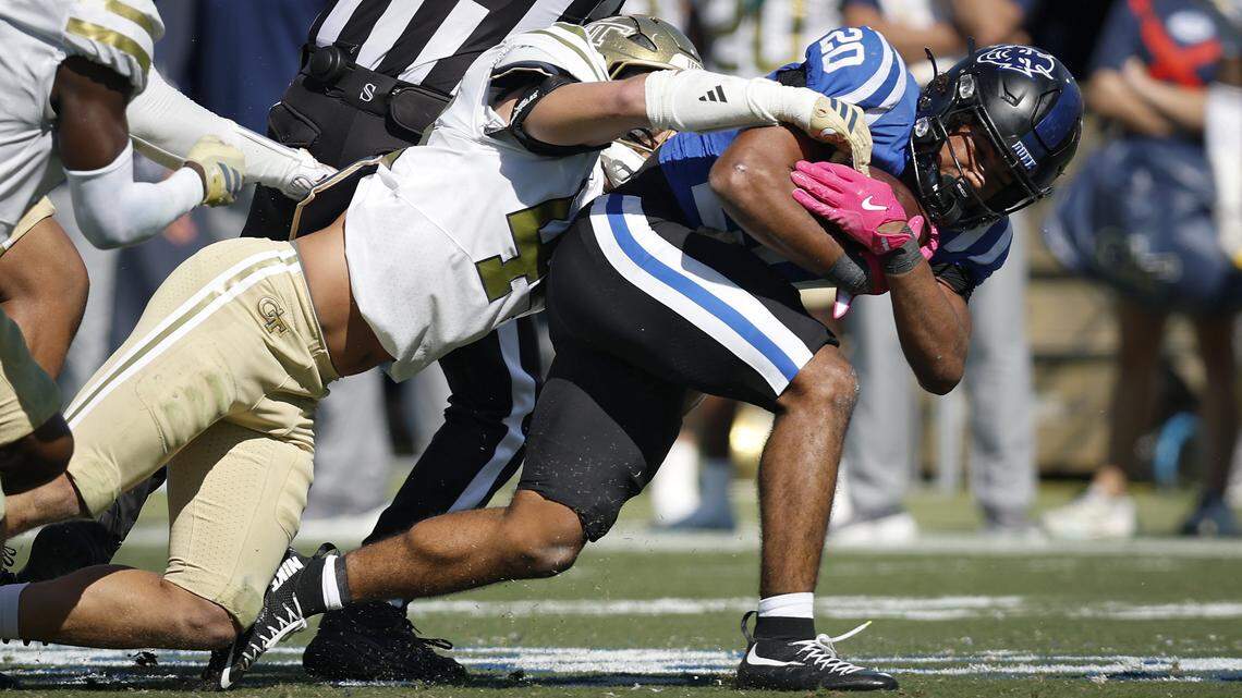 Duke running back Nate Sheppard is brought down by Georgia Tech linebacker Kyle Efford during the first half of the Blue Devils’ game on Saturday, Oct. 18, 2025, at Wallace Wade Stadium in Durham, N.C.
