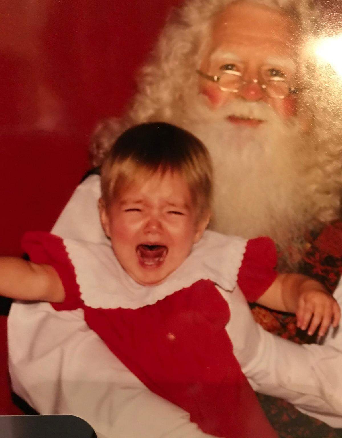 Celesta Carlson’s daughter with Santa.