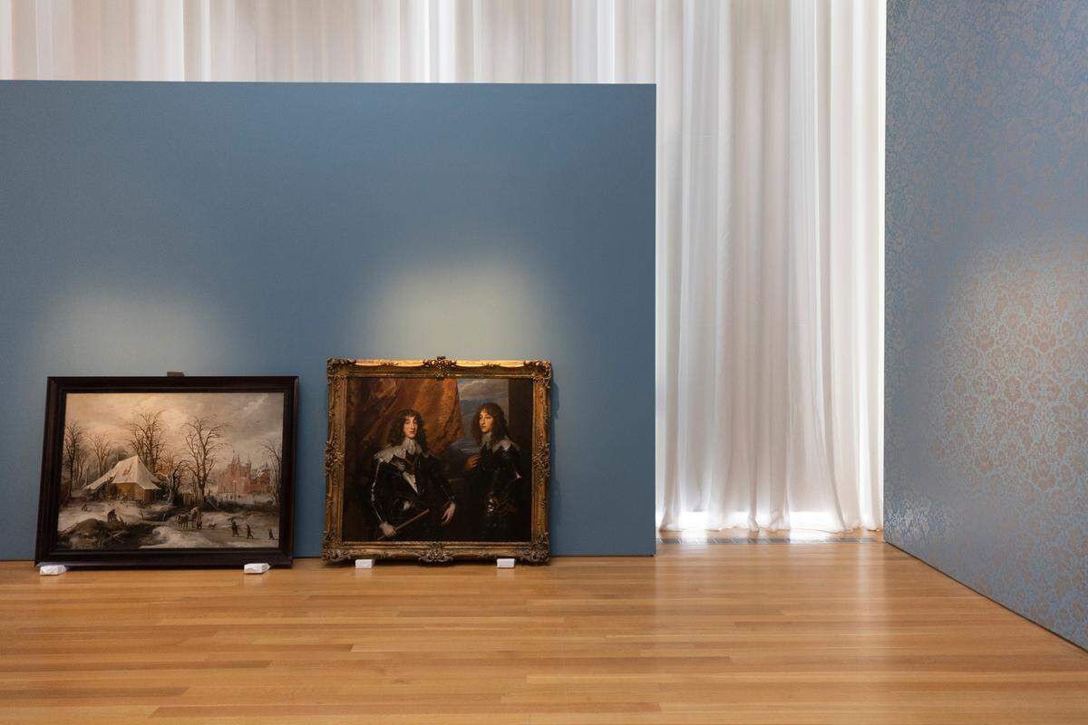 The Kunstkänner room has an added touch of color to accentuate paintings by Joose de Momper II (The Younger),&nbsp;Winter Landscape, left and Workshop copy after Anthony van Dyck, Prince Charles Louis (1617–1680) and Prince Rupert (1619–1682) in the West Building on Sept. 20, 2022, in Raleigh.