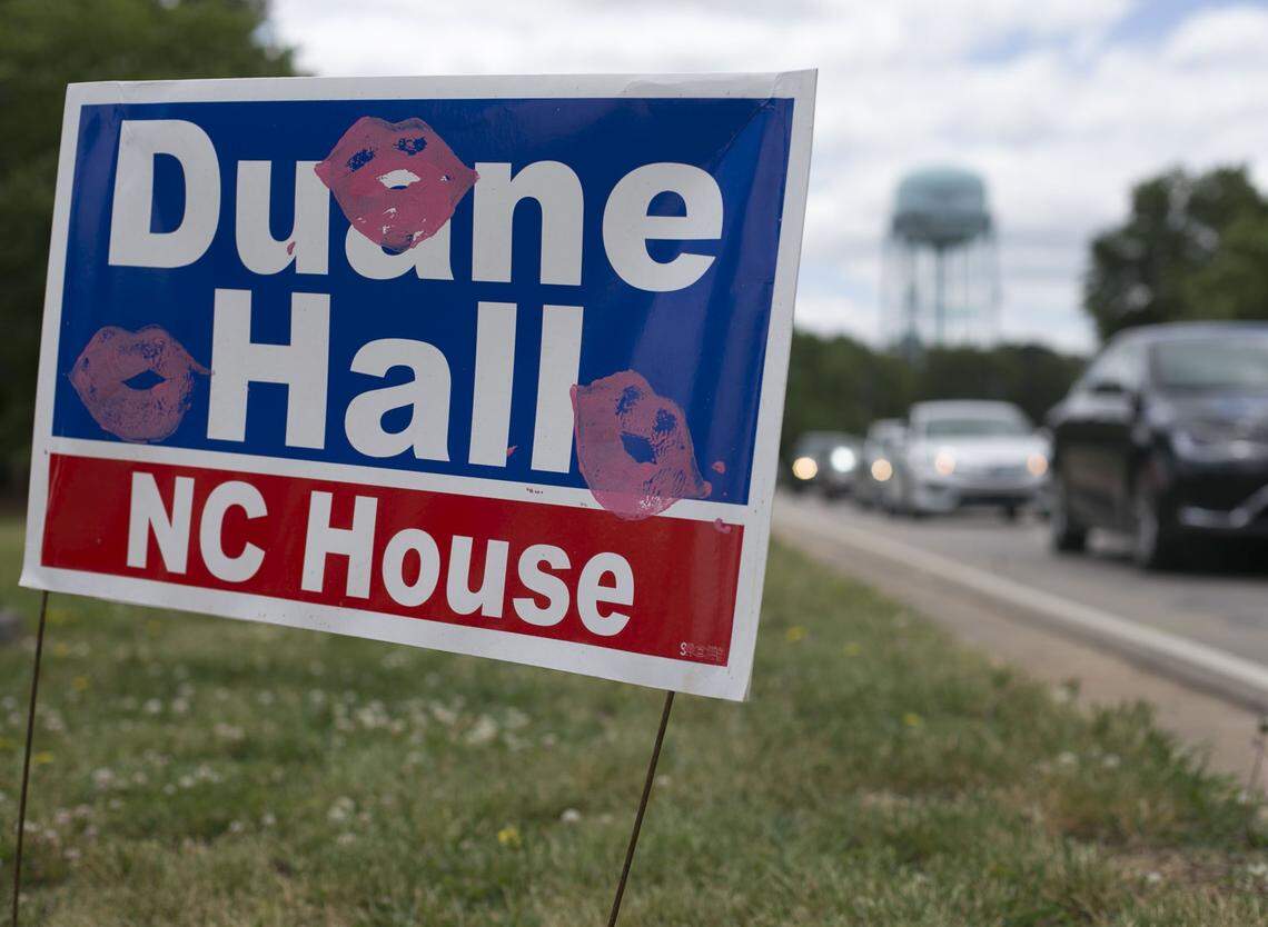 Campaign signs for N.C. House candidate Duane Hall have been marked with a pink stencil of red lips amid allegations of sexual misconduct that Hall has denied. This sign was photographed on Monday, May 7, 2018, at the intersection of Maynard and Walnut streets in Cary, N.C.