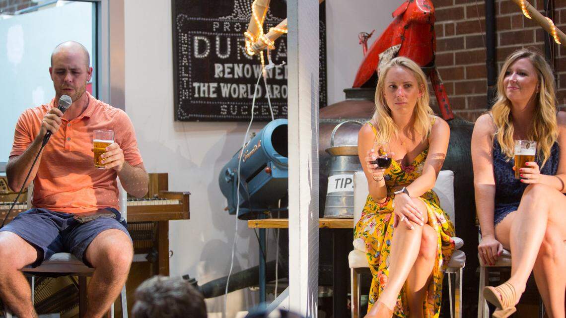 Tom Stern, Kate Lundy, and Bridger Davenport participate in the comedy dating show Love at First Pint at Fullsteam Brewery Wednesday July 11, 2018.