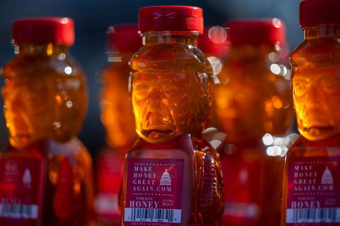 Bottles of honey in the likeness of former President Donald Trump is for sale outside Minges Coliseum in Greenville prior to a rally on Monday, Oct. 21, 2024. With two weeks until Election Day, Trump went on a three-city tour, in which Trump will also see the destruction caused by Hurricane Helene in Asheville and speak at a faith conference in Concord.