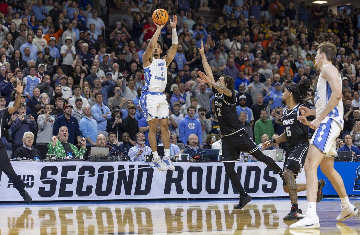 With the game tied at 75, North Carolina guard Seth Trimble (7) misses a three point shot with :02 to play in the second half against VCU on Thursday, March 18, 2026, during the first round of the NCAA Tournament at Bon Secours Arena in Greenville, S.C.