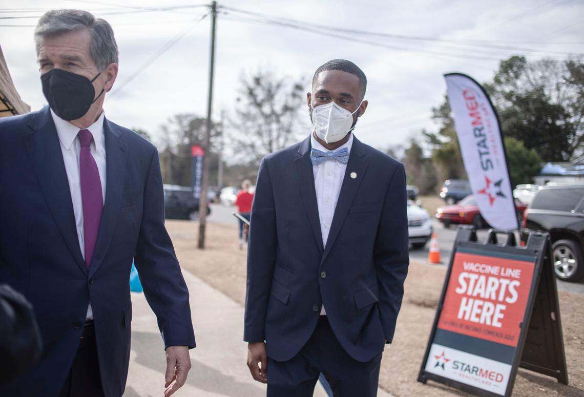 Kinston City Council member Chris Suggs waits to speak with Governor Roy Cooper at a COVID-19 vaccination and testing event put on by Kinston Teens at Holloway Community Center in Kinston, N.C. on Jan. 13, 2022.