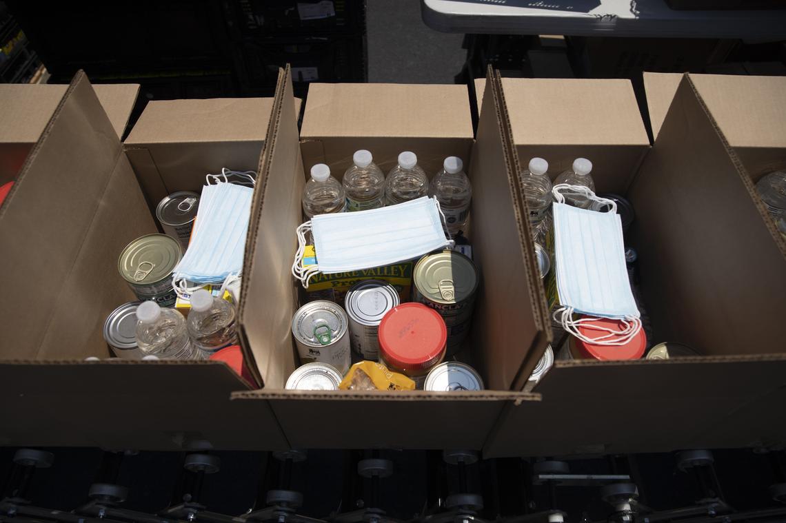 Emergency preparedness kits filled with food, water and other supplies packed by Raleigh Inter-faith Food Shuttle volunteers to disburse to families and individuals in case of a flood or hurricane in June 2021.