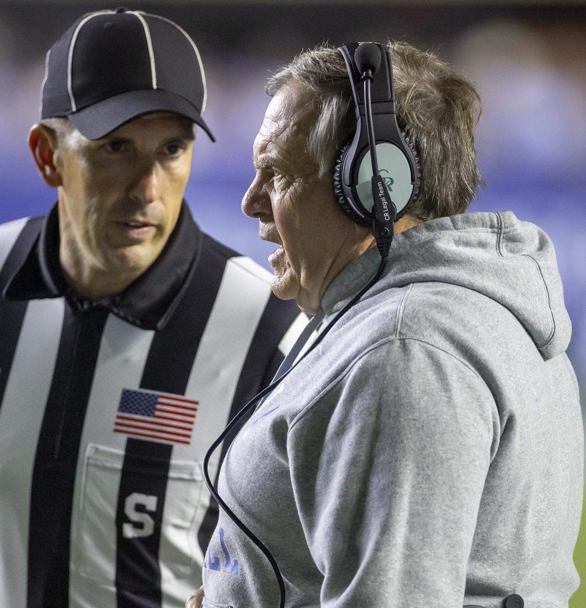 North Carolina coach Bill Belichick has a word with side judge J.B. Garza following a turnover in the second quarter against TCU on Monday at Kenan Stadium. 