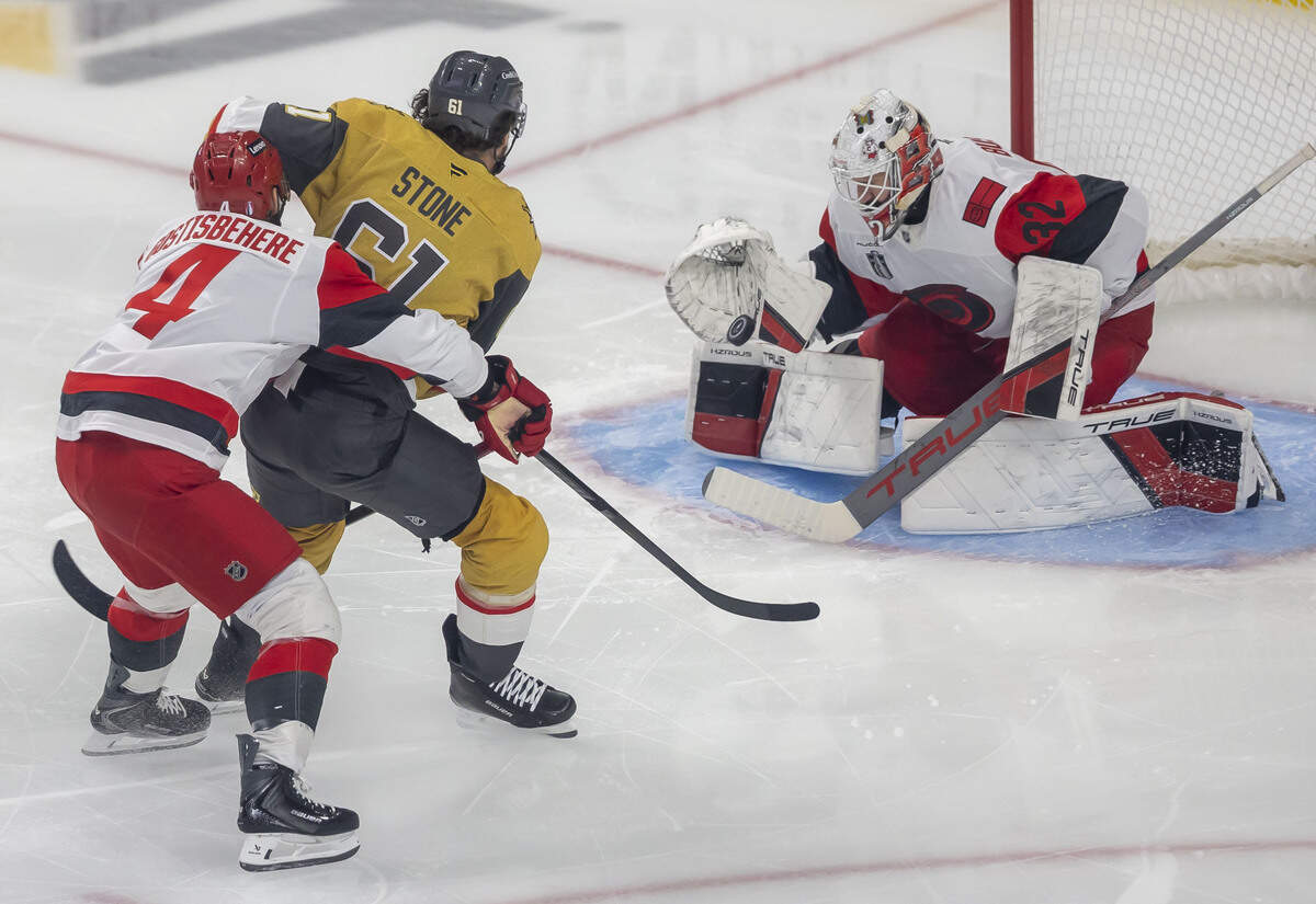 Carolina Hurricanes goalie Brandon Bussi (32) makes a glove save on a scoring attempt by right wing Mark Stone (61) in the first period of Game 4 of the Stanley Cup Final, on Tuesday, June 9, 2026 in Las Vegas, NV.