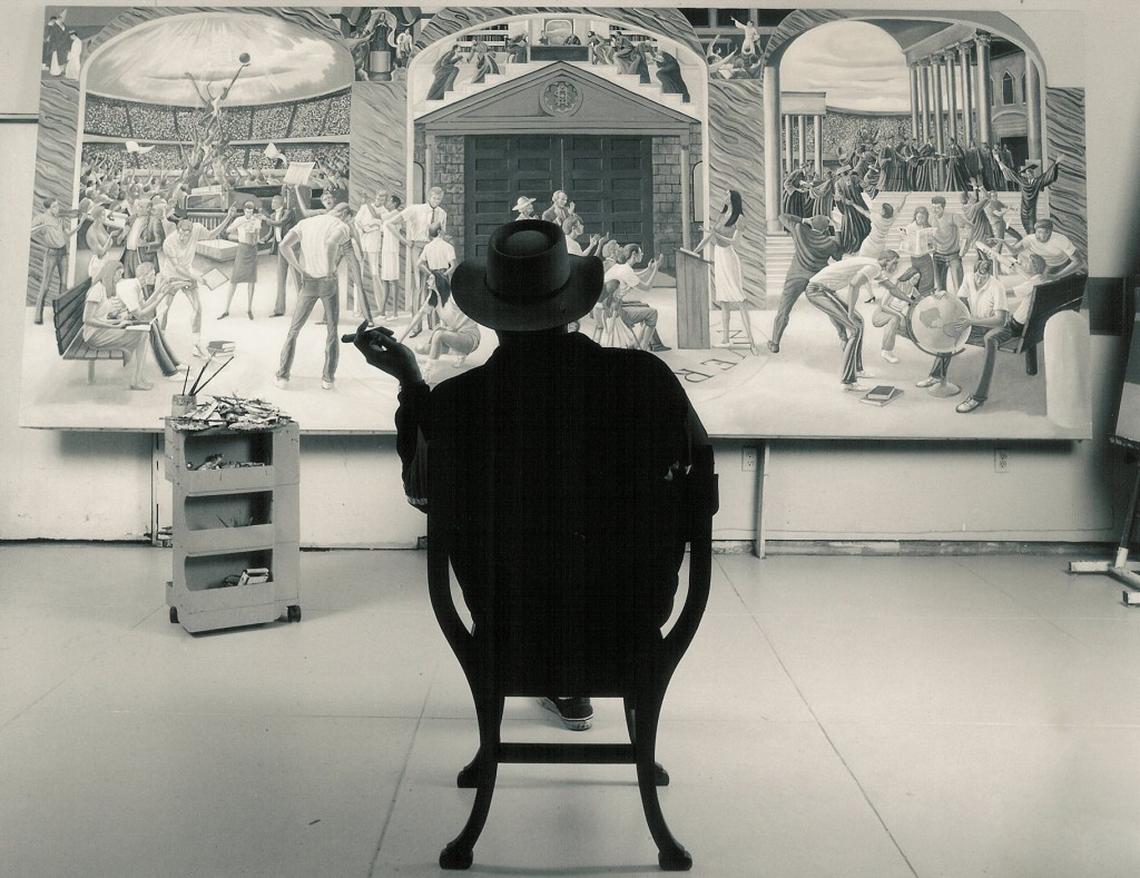 Artist and Durham native Ernie Barnes in front of one of his canvases in 1992. Barnes’ work will be on display in "The North Carolina Roots of Artist Ernie Barnes" exhibition at the North Carolina Museum of History, which opens June 29 and runs through March 3.