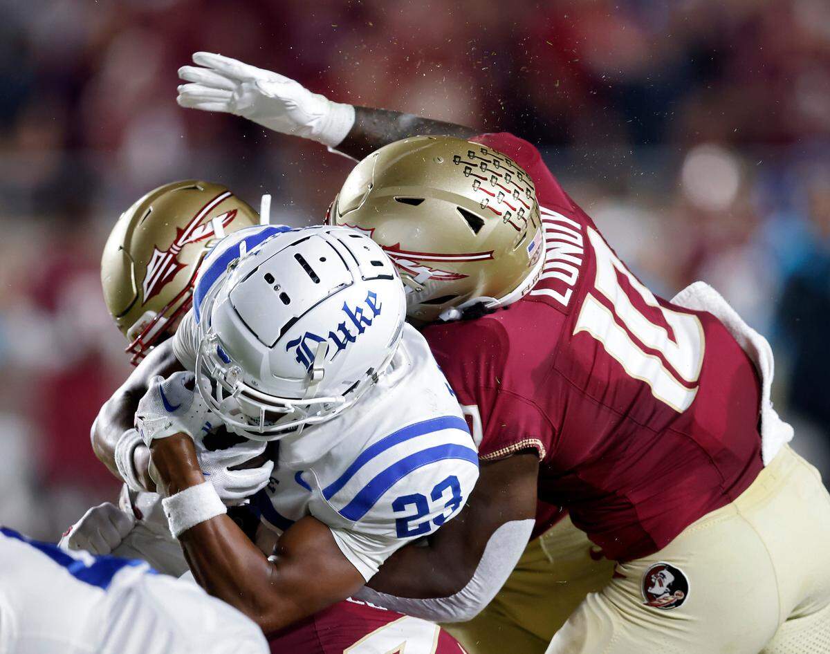 Duke’s Terry Moore is tackled by Florida State’s DJ Lundy during the first half of the Blue Devils’ 38-20 loss on Saturday, Oct. 21, 2023, in Tallahassee, Fla.