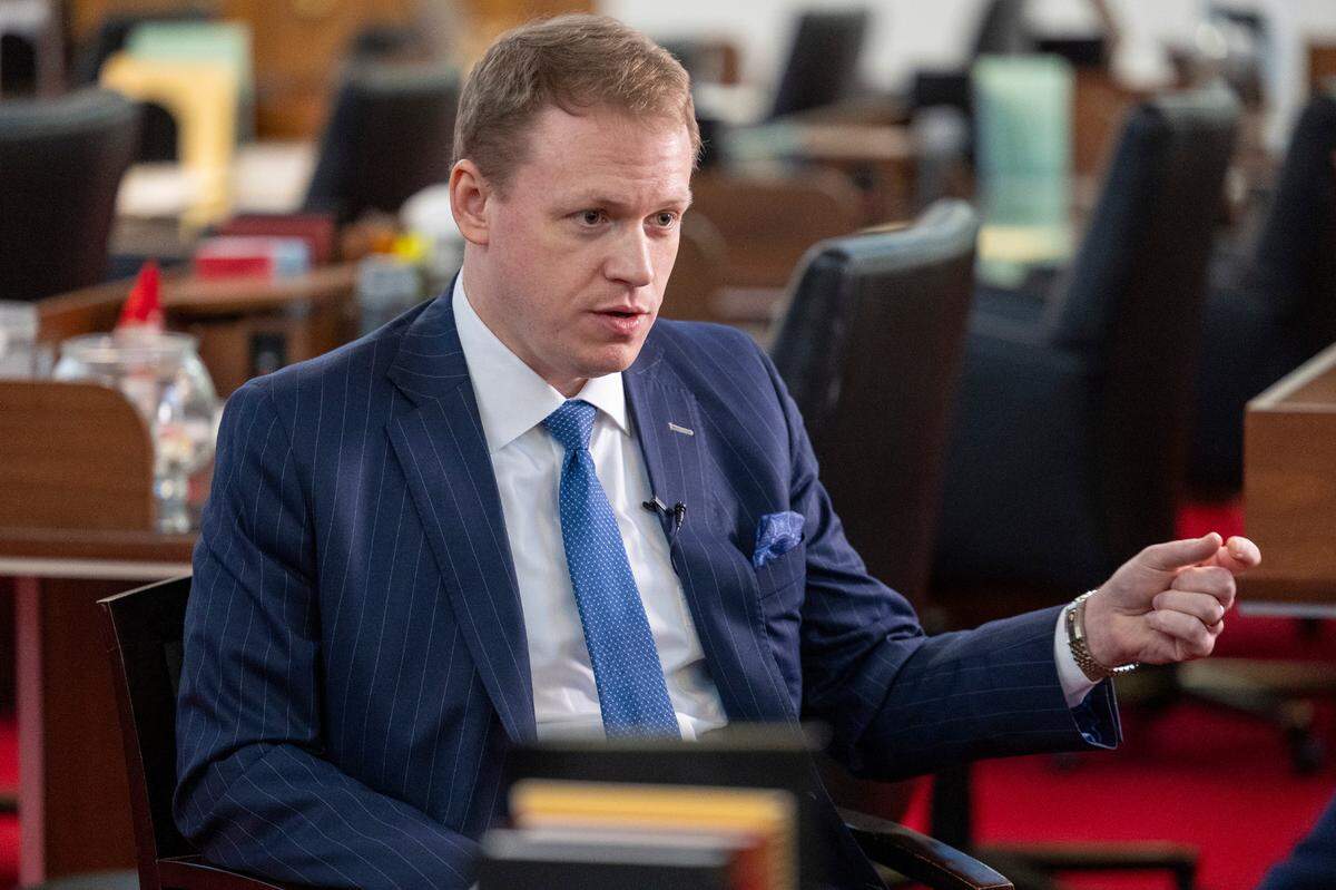 Rep. Destin Hall, a Caldwell County Republican, answers a reporter’s questions during an interview at the North Carolina Legislative Building on Thursday, March 21, 2024.