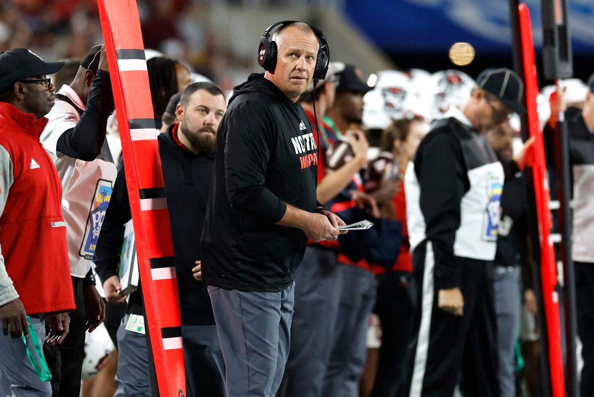 N.C. State head coach Dave Doeren watches during the first half of N.C. State’s game against Kansas State in the Pop-Tarts Bowl at Camping World Stadium in Orlando, Fla., Thursday, Dec. 28, 2023.