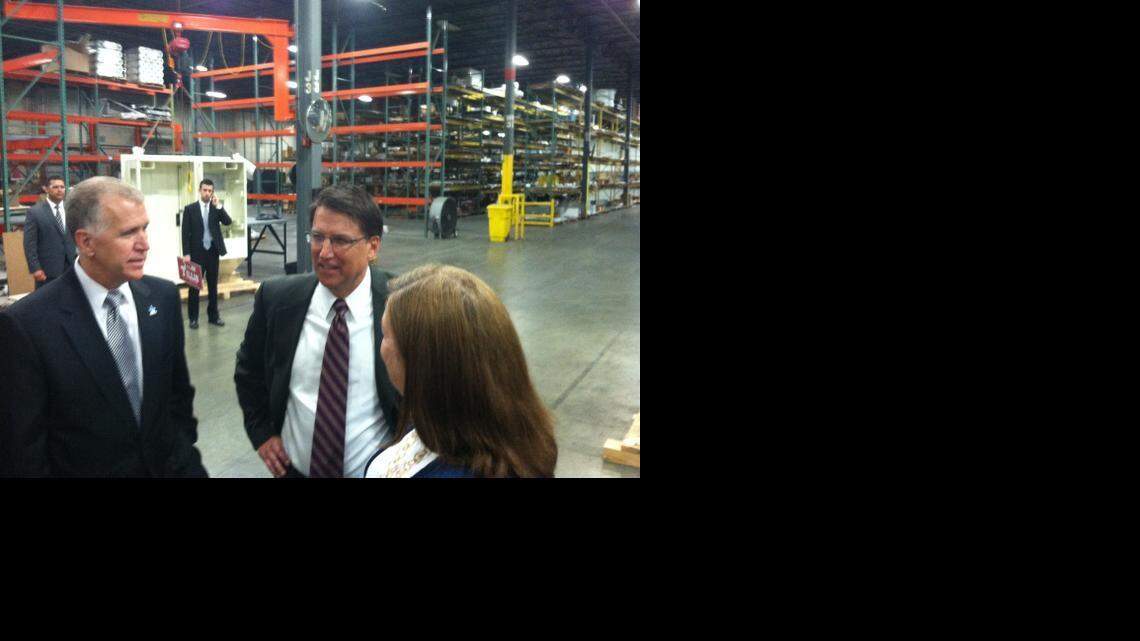House Speaker Thom Tillis, left, and Gov. Pat McCrory, center, take a tour of SMT, a Raleigh manufacturing company led by CEO Susan Rothecker, right.
