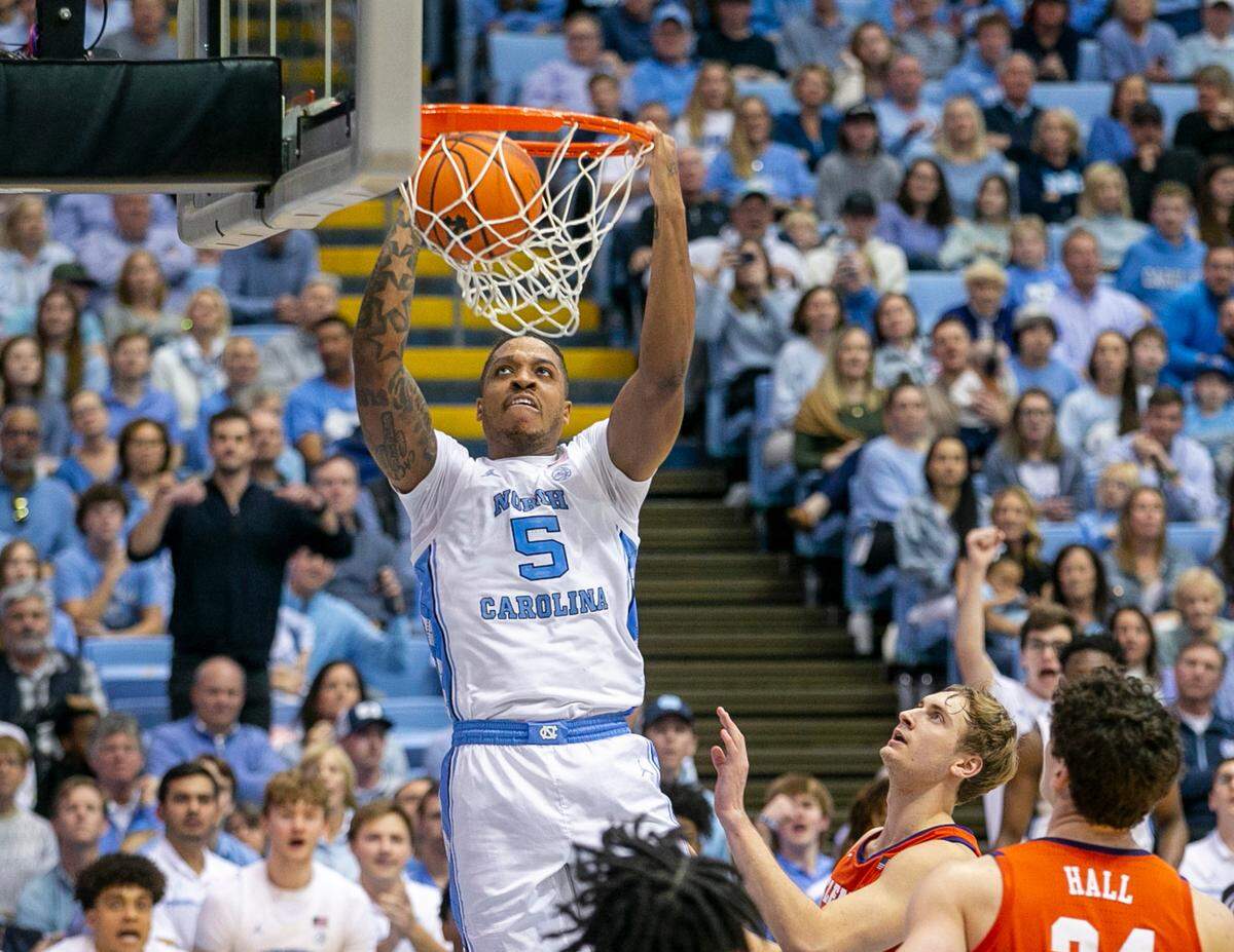 North Carolina’s Armando Bacot (5) gets a dunk in the second half against Clemson on Saturday, February 11, 2023 at the Smith Center in Chapel Hill, N.C.