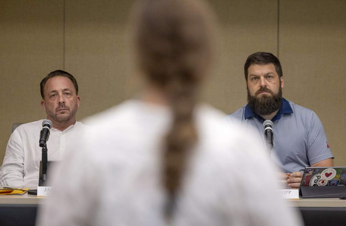 Pittsboro Commissioner James Vose and Mayor Kyle Shipp and listen to Kimberly Conan as she voices her concerns about stormwater runoff following flooding by Tropical Storm Chantal, during the Pittsboro Board of Commissioners meeting on Monday July 14, 2025 in Pittsboro, N.C. 