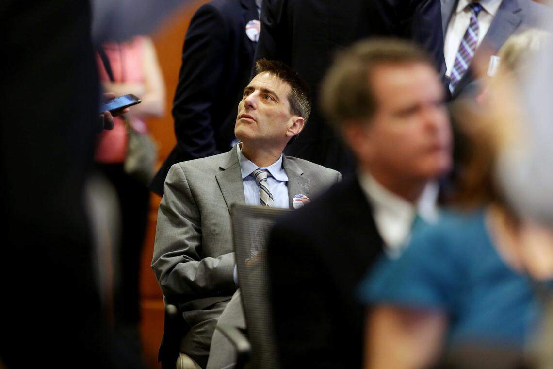 Executive director of the NC GOP Dallas Woodhouse is seated in the crowd during the public evidentiary hearing on the 9th Congressional District investigation Monday morning, Feb. 18, 2019, at the North Carolina State Bar in Raleigh.