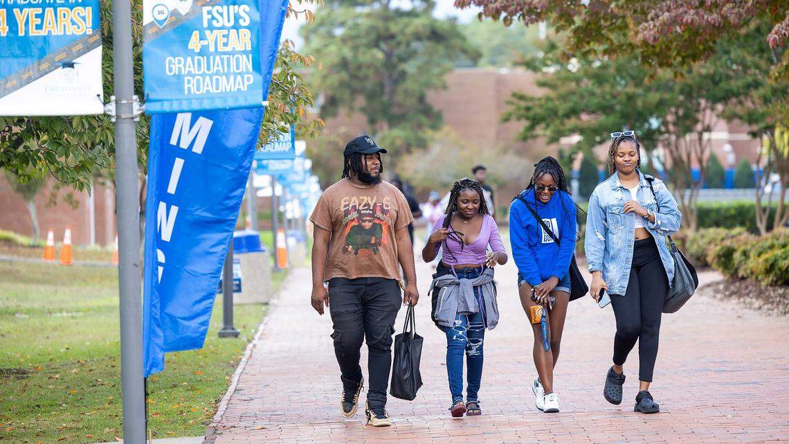 Fayetteville State University students walk on Fayetteville State’s campus Friday, Oct. 20, 2023.