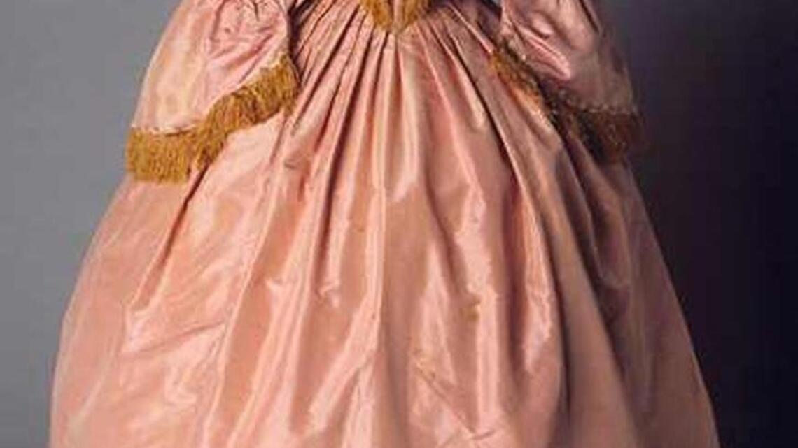 Those pouffy hoop skirts and slinky flapper dresses tell the story of our time