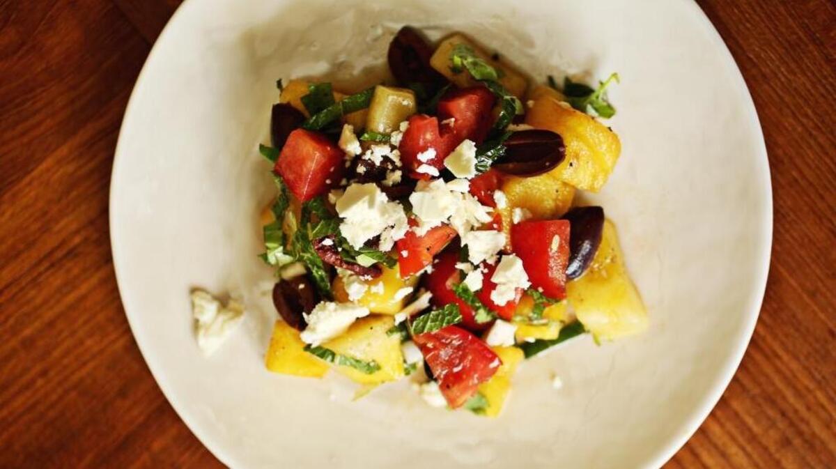 Watermelon and Feta Salad with Mint and Basil can be made in the morning or even the day before and dressed right before serving.