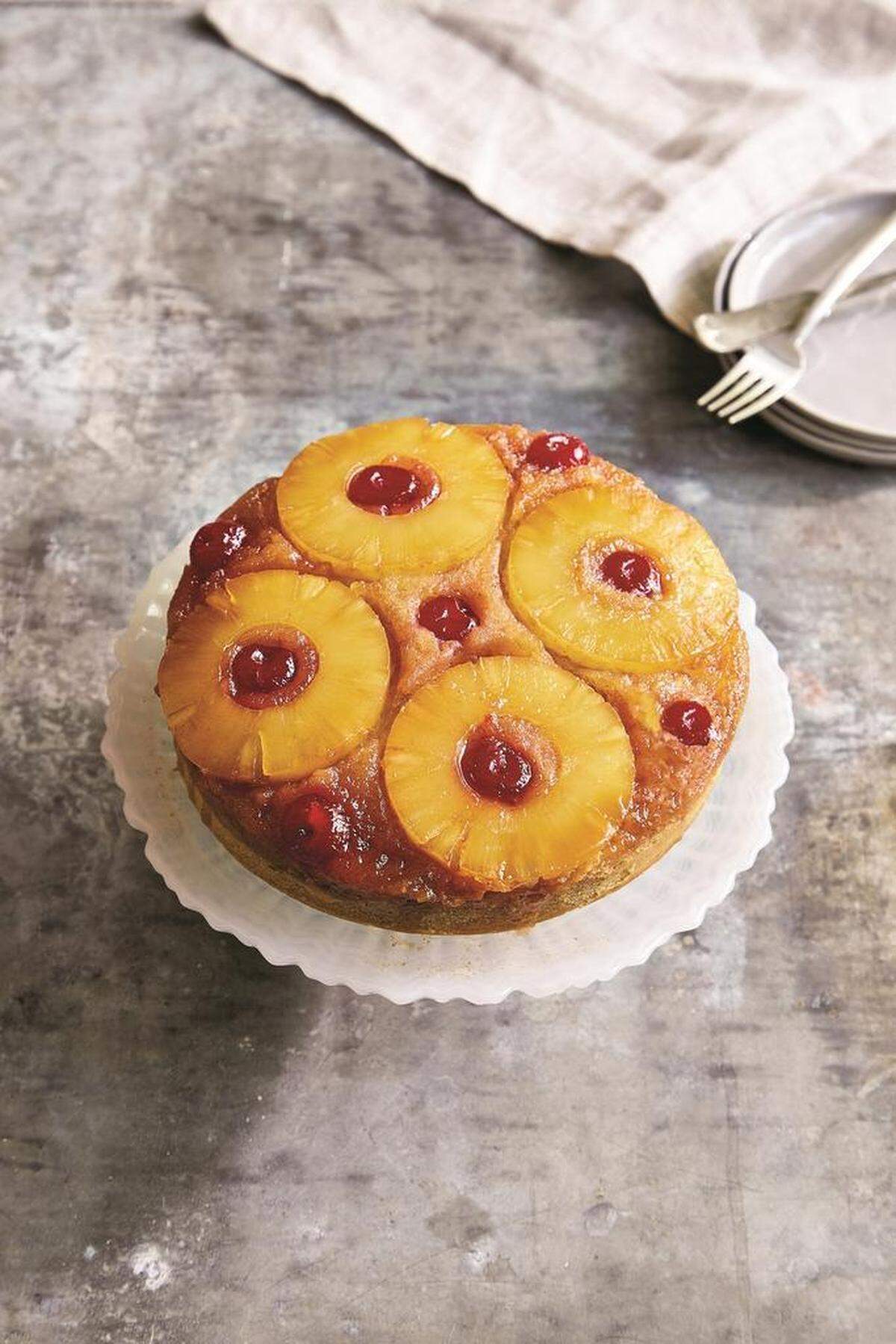 Author Sheri Castle demonstrates that multicookers can produce stunning desserts, including Pineapple Upside Down Cake. The recipe appears in her new cookbook, “Instantly Southern,” a new collection of 85 recipes that can be made in a multicooker.