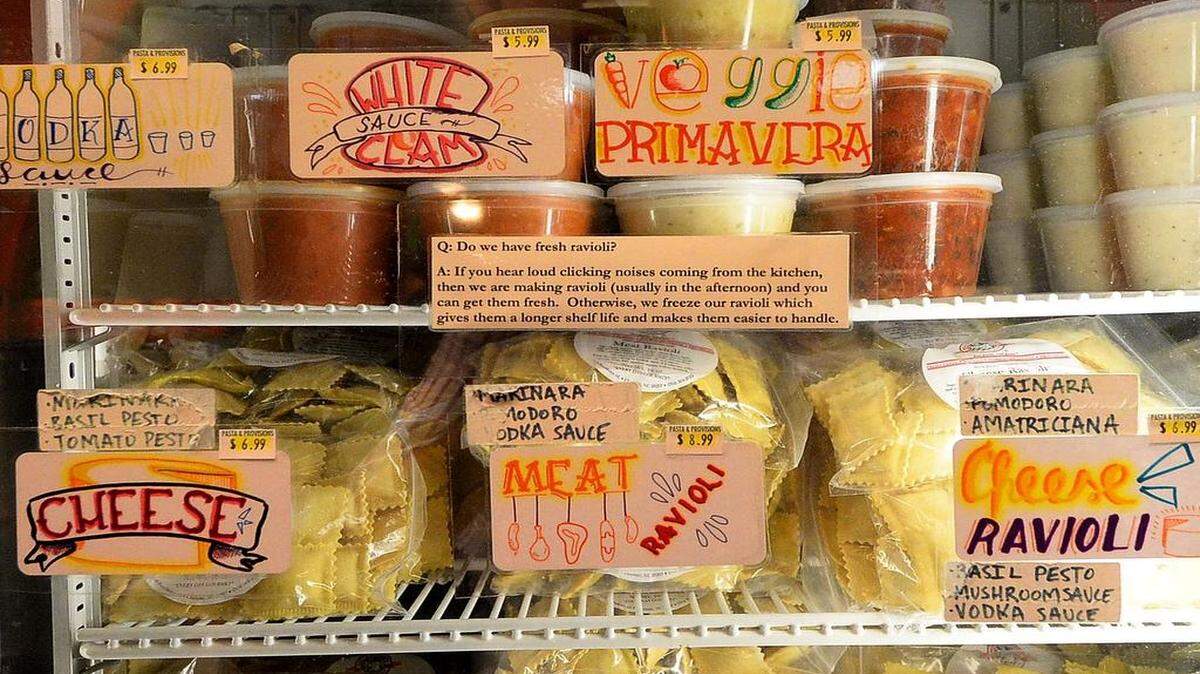 Shelves of prepared ravioli and sauces at Pasta & Provisions.