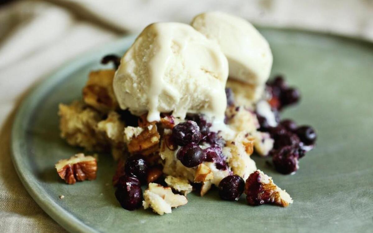 So Easy Blueberry Pecan Crunch (topped with vanilla ice cream) from “Crisps, Cobblers, Custards & Creams,” by Jean Anderson.