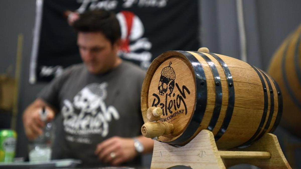 John Benefiel makes a rum drink during a taste testing at the Raleigh Rum Company’s distillery in northeast Raleigh in 2015. The distillery is featured in the new book, “Still & Barrel: Craft Spirits in the Old North State” by John Francis Trump.