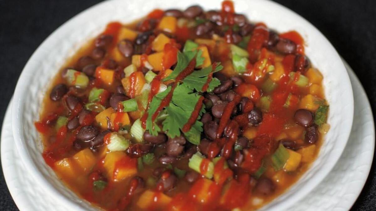 Brule puts a twist on Southern-style beans by combining black beans and sweet potatoes in a stew with ginger, orange and Asian-style hot sauce.