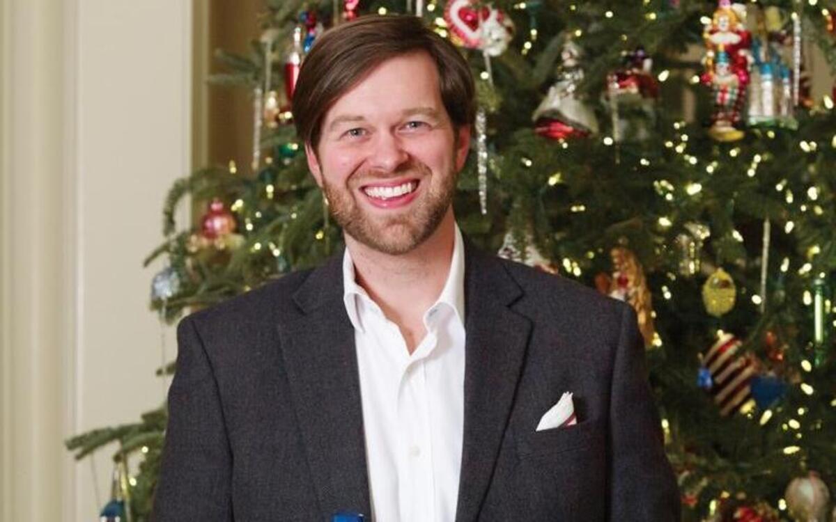 James Farmer with a tray of Sweet-and-Spicy Pecans.