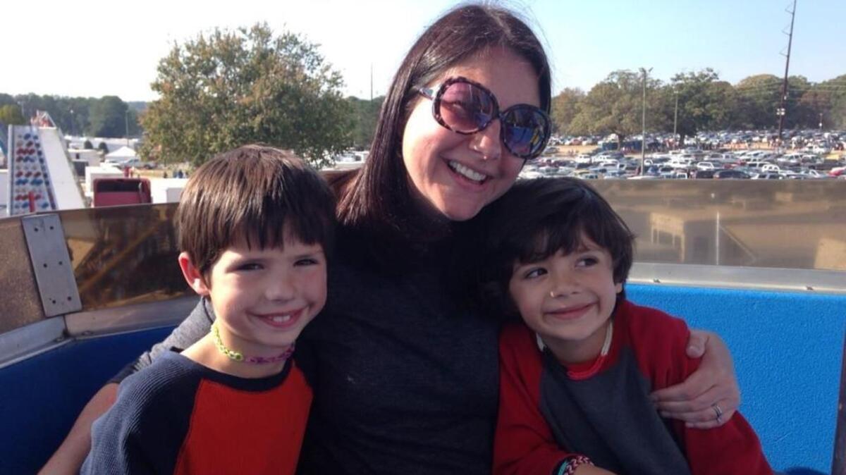 Here I am with my boys, James, left, who’s now 12, and Jackson, right, who’s 9, at the State Fair in 2013. I can’t find a more recent photo of the three of us since I’m the one that usually takes all the pictures.