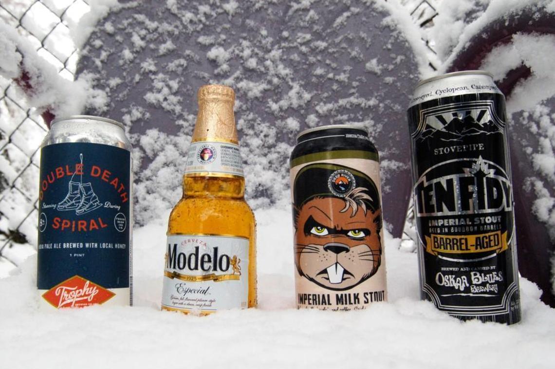 Snow days seem to call out for a beer. Four to consider are, from left to right, Trophy Double Death Spiral double IPA, Model Especial, Deep River Brewing Collaboration without Representation chocolate milk stout and Oskar Blues Ten Fidy imperial stout.