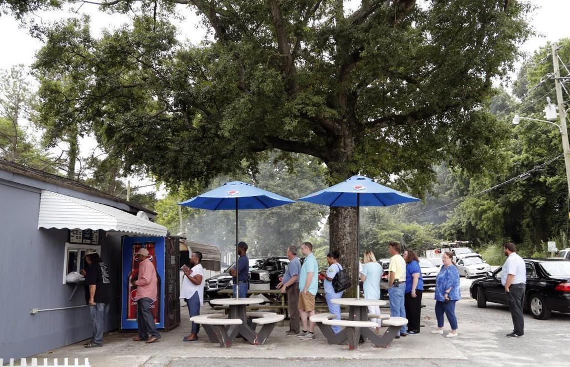 By 11:00 am, people are already lined up at the take-out window of B's Barbecue in Greenville NC, on June 7, 2017. They often sell out of their chicken or barbecue by noon or 12:30. B's is an old-time barbecue restaurant that ranks near the best in the state in several surveys.