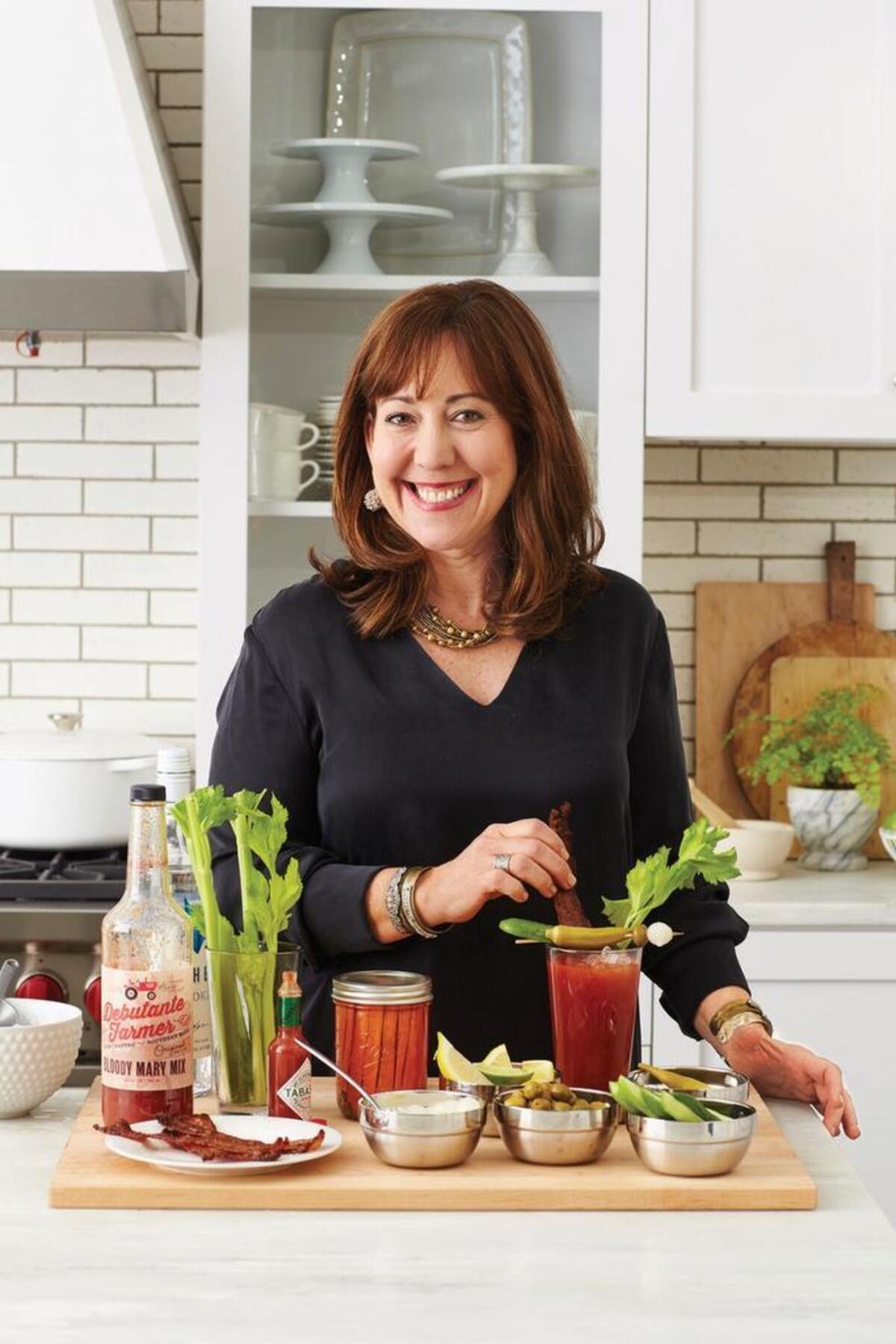 Elizabeth Heiskell, a contributor to “Today” and Southern Living, is author of the new cookbook, “What Can I Bring? Southern Food for Any Occasion Life Serves Up.” A great drink is essential for a successful tailgate, Heiskell says. She’s partial to her father’s Bloody Mary recipe.