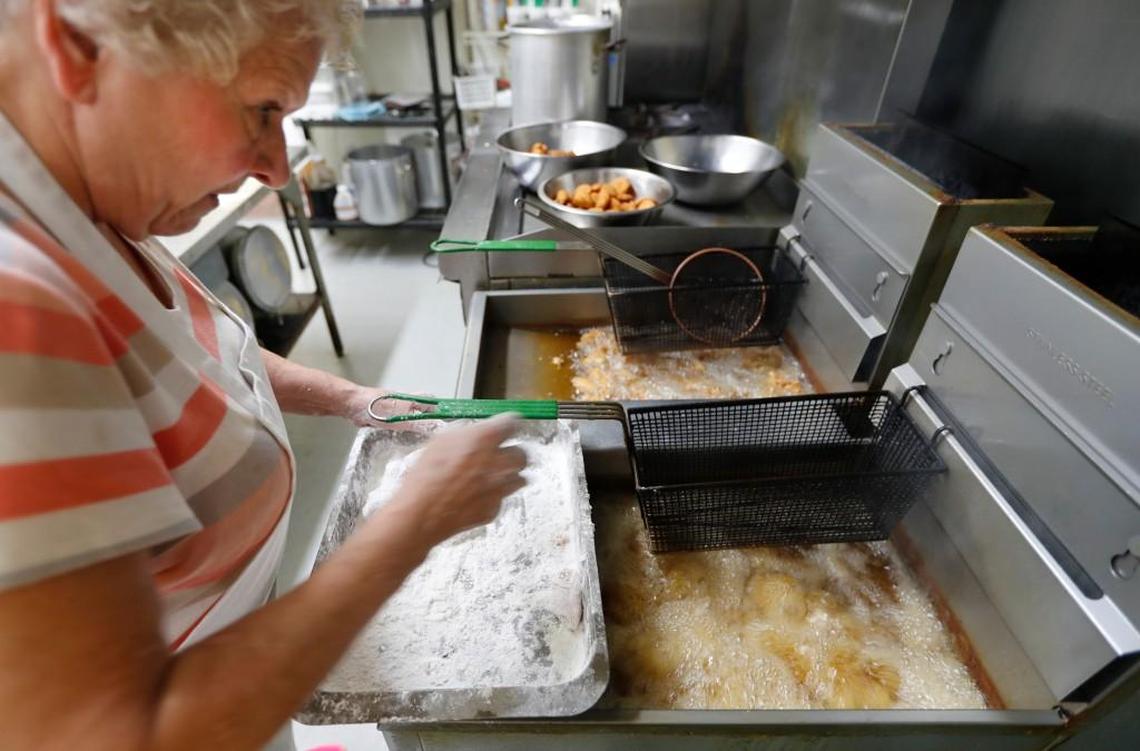 Shelby Dawkins prepares to fry chicken at Seaboard Station Restaurant in Hamlet, N.C., Thursday, June 22, 2017.