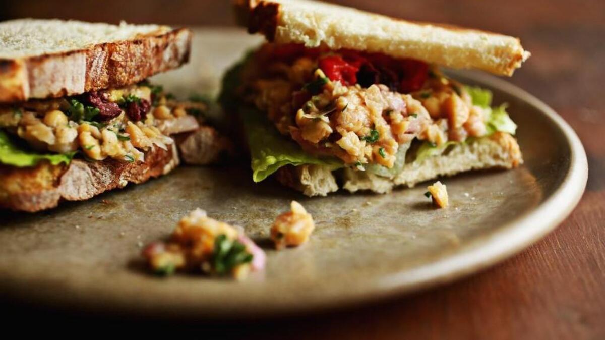 The marinated chickpea sandwich, which combines a marinated chickpea spread, roasted red peppers, diced Kalamata olives and preserved lemons, has not left the menu since Night Kitchen Bakehouse and Cafe opened in 2014.