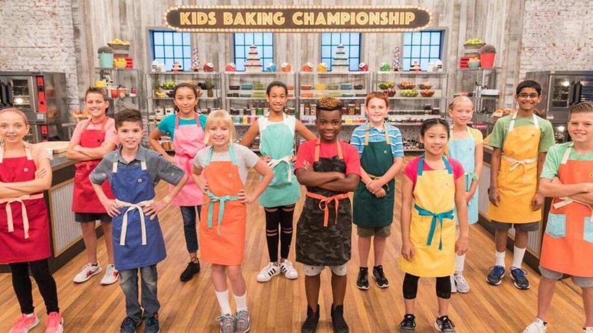 Aditya Pillutla, far right back row, is one of 12 contestants in season four of Food Network’s “Kids Baking Championship.” At stake is a prize of $25,000, a feature in Food Network magazine and the title of Kids Baking Champion.