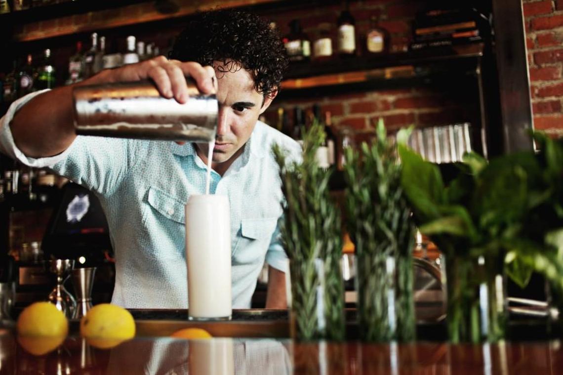 Daniel Sartain, owner and managing partner at Bar Virgile in Durham, makes a Ramos Gin Fizz in this 2015 file photo.