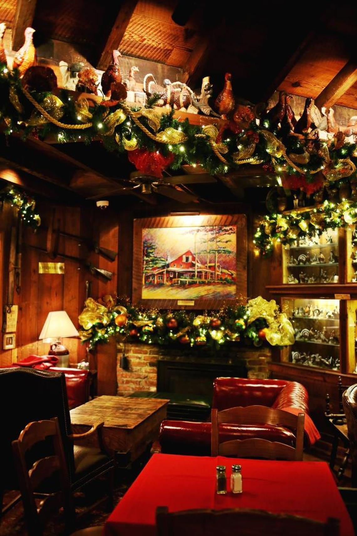 The Wild Turkey Bar & Lounge at the Angus Barn is filled with whiskey decanters and is a beloved nook in the restaurant.