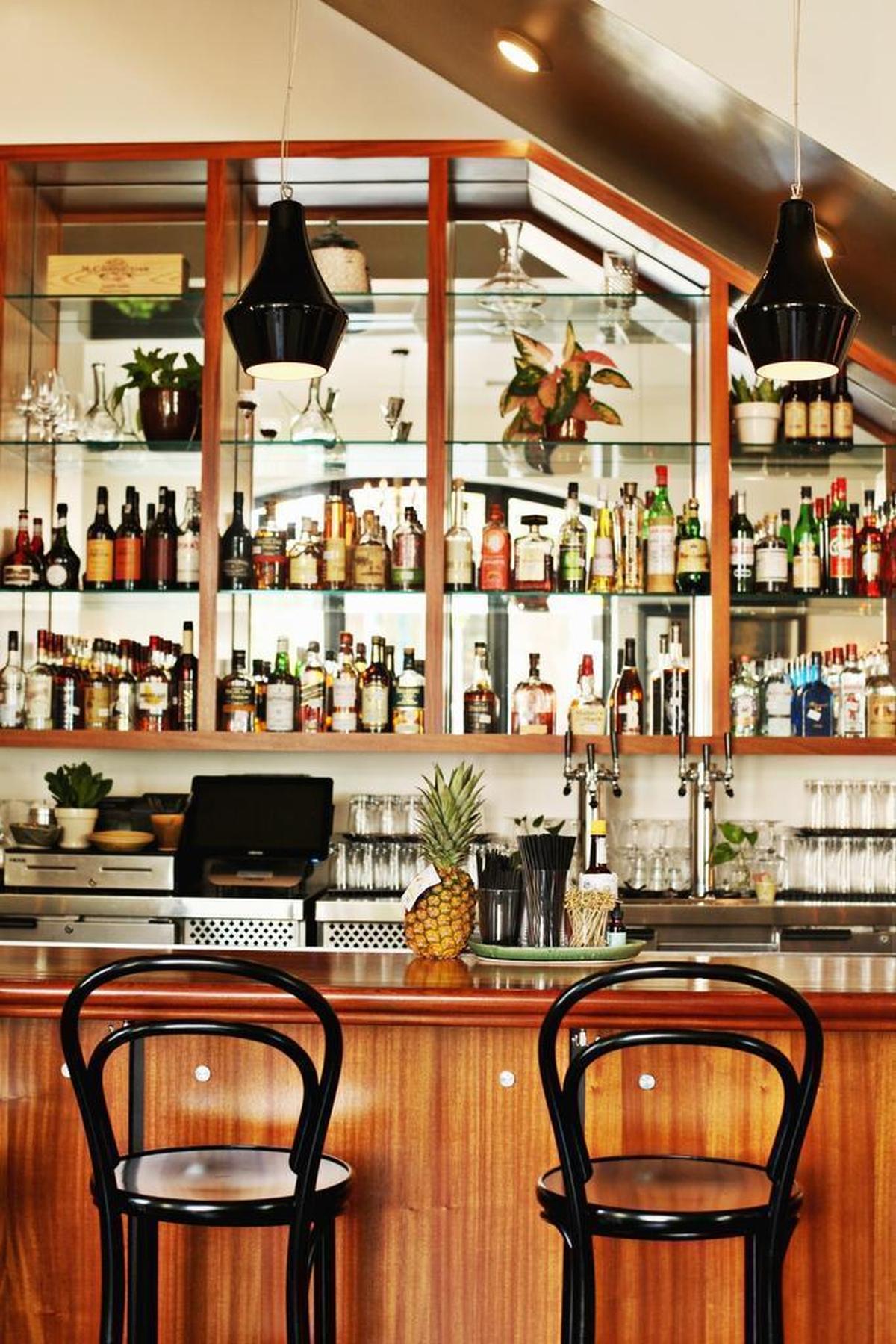 The bar at Death & Taxes in downtown Raleigh; the restaurant is taking reservations for New Year’s Eve 2016.
