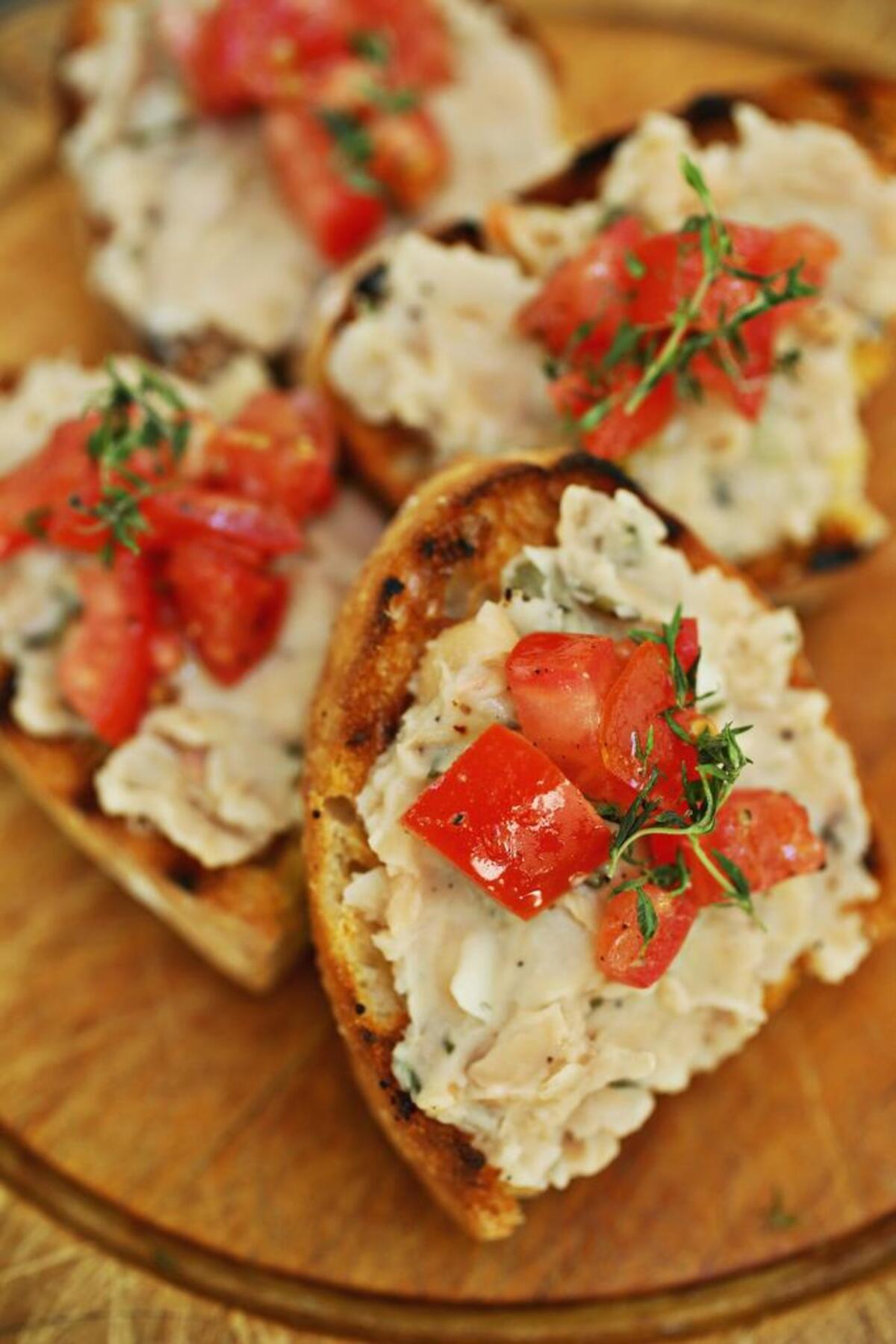 Grilled Bread with Rosemary Scented White Bean Puree is a perfect dish to make ahead as it can be served at room temperature.