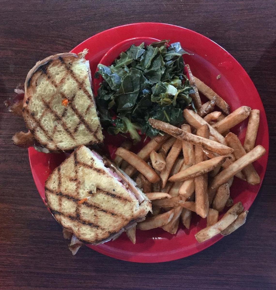 The "Pattan Special" is the signature sandwich at Pattan's Downtown Grille in Rockingham, N.C. The eatery sold over 10,000 of the sandwiches last year. The description from the menu: thin slices of slow-smoked pork loin drizzled with our sweet swamp sauce, topped with bacon, lettuce, tomato, and mayo, served on grilled sour dough bread." This sandwich came with a side of fresh collards and french fries.