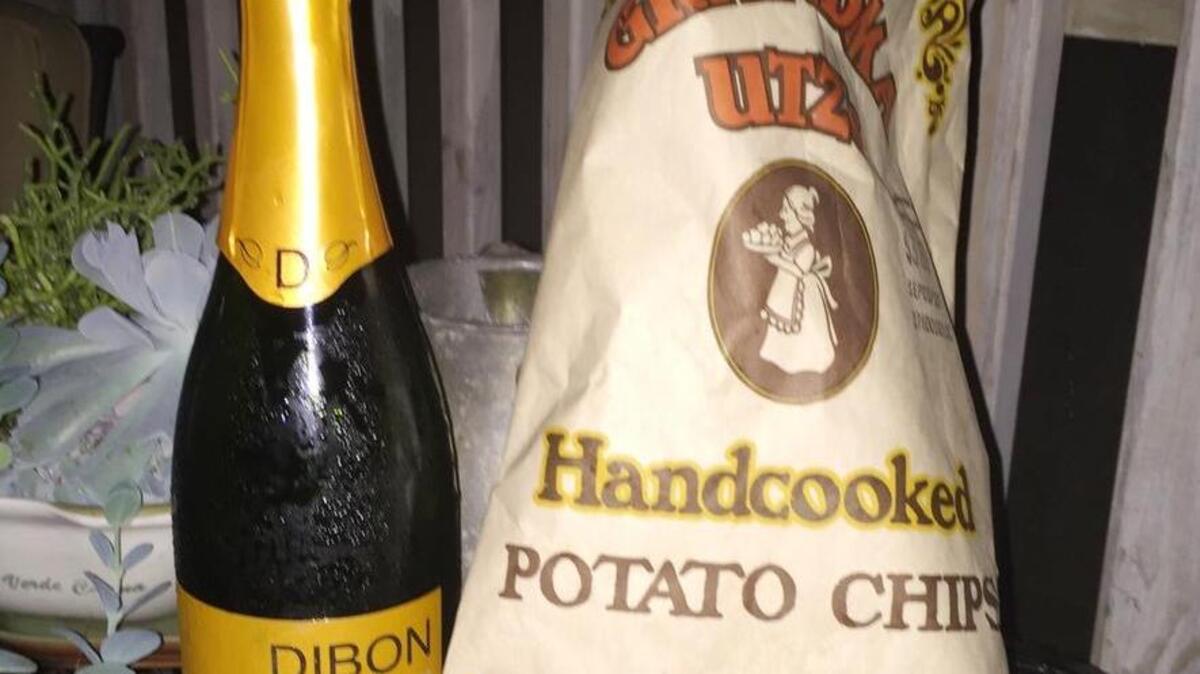 Amber Nimocks enjoyed fancy potato chips with Dibbon Cava Brut while on vacation.