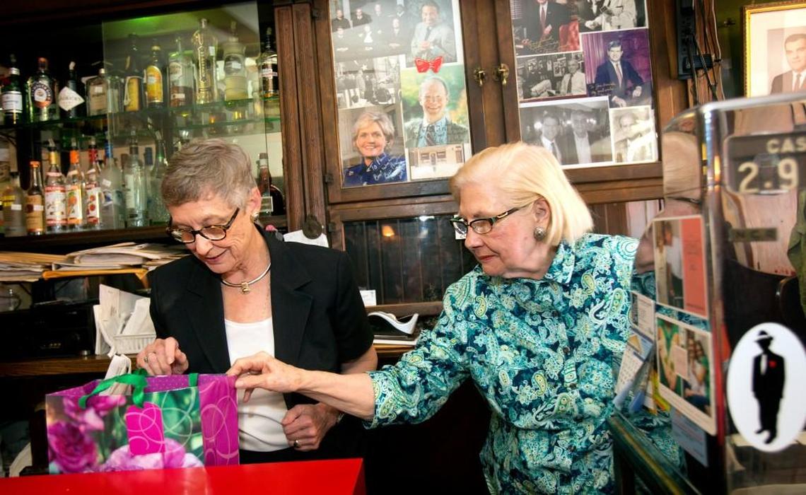 Floye Dombalis, right, pictured in 2014, is part of the family that owns the Mecca restaurant in downtown Raleigh. She is photographed with then-N.C. State Chief Supreme Court Justice Sarah Parker.