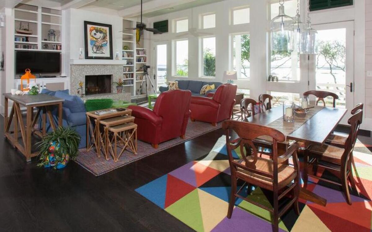
Recreating the carefree feel of their former Caribbean style NC coastal getaway in the client’s new New England style home was the challenge presented to Carol Adcock, owner and principal design of Defining Design, LLC. The no-worry plan included Duralee’s Pavilion Indoor/Outdoor fabric, custom sized outdoor Capel rug, and FLOR carpet tiles that can be easily cleaned or replaced. The background color scheme of the space remains neutral with splashes of color throughout.

