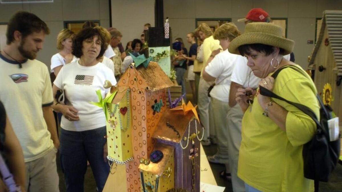 Visitors look at the entries in the annual birdhouse competition at the JC Raulston Arboretum. This year’s event is April 2.