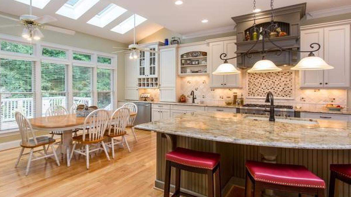 
With a table for six and island seating for three, entertaining family and friends is a breeze in this updated kitchen.


