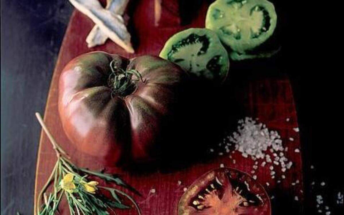 
Heirloom tomatoes, white anchovies and wild arugula can make a tasty summer salad. 
