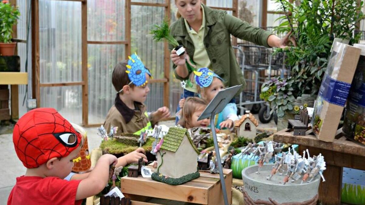 Children learn how to make fairy gardens at Fairview Garden Center in Raleigh.