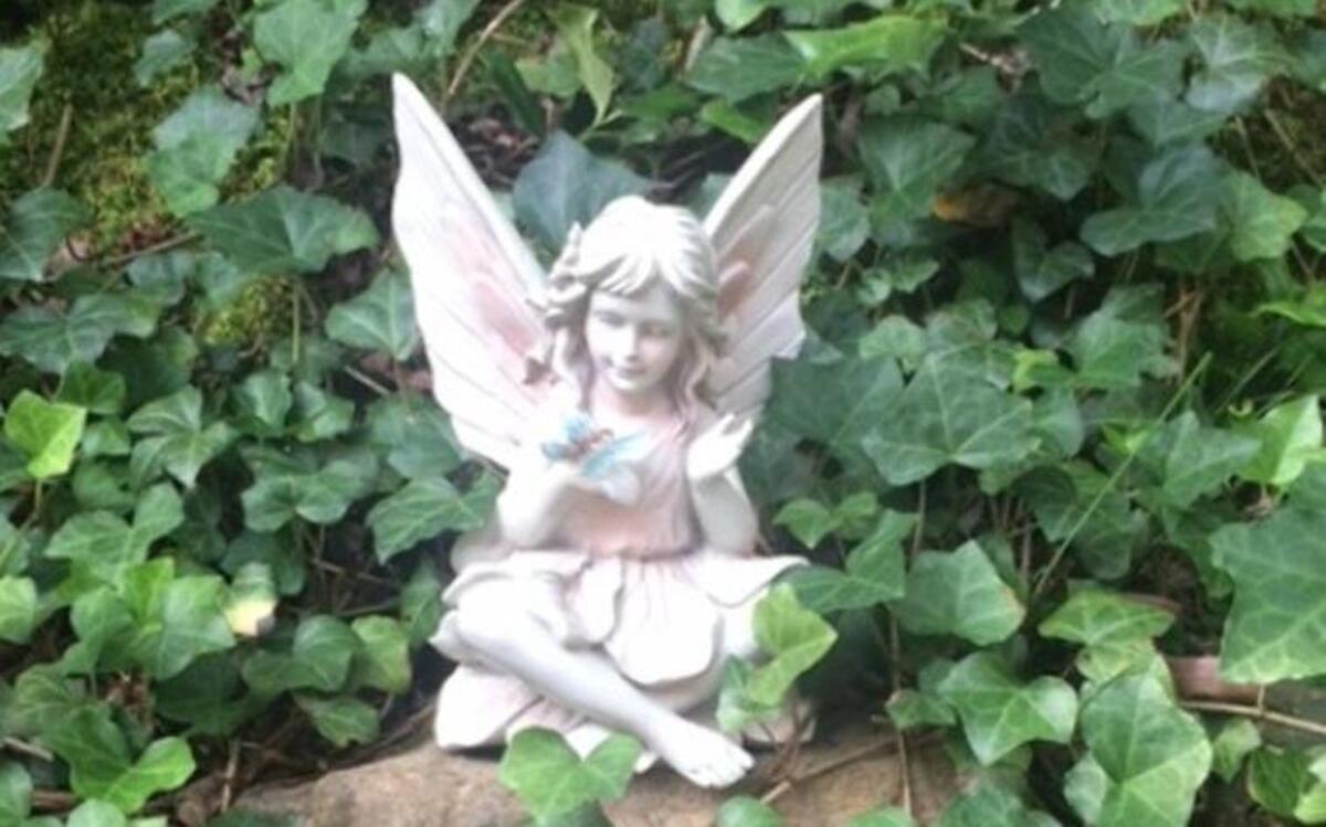 
Francie the Fairy graces Bernie Brown’s North Raleigh backyard like a lucky clover.
