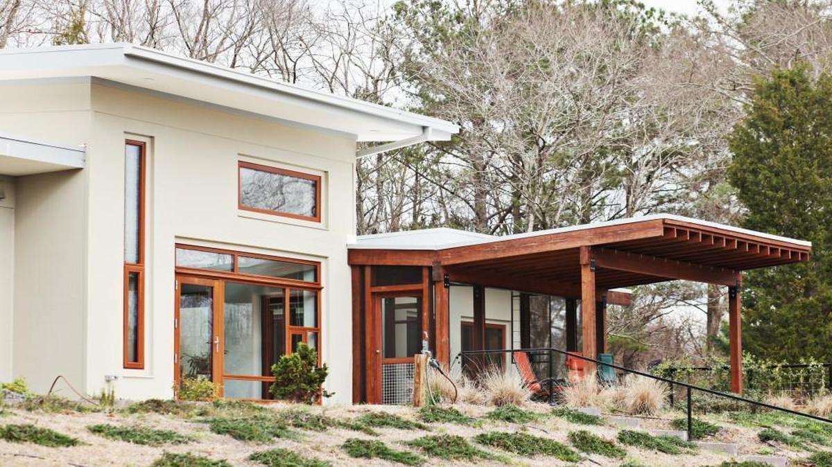 The Happy Meadows Courtyard House is a highly efficient, ultra-modern home with spare, midcentury appeal.
